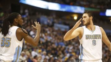 Mar 13, 2015; Denver, CO, USA; Denver Nuggets forward Danilo Gallinari (8) and Denver Nuggets forward Kenneth Faried (35) celebrate during the first half at Pepsi Center. Mandatory Credit: Chris Humphreys-USA TODAY Sports