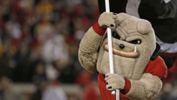 ATLANTA - NOVEMBER 24: Georgia Bulldogs mascot Hairy Dawg runs in the end zone with the Georgia flag after a touchdown during the game against the Georgia Tech Yellow Jackets on November 24, 2007 at Bobby Dodd Stadium at Historic Grant Field in Atlanta, Georgia. (Photo by Mike Zarrilli/Getty Images)