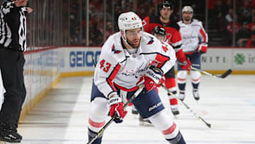 NEWARK, NJ - MARCH 19: Tom Wilson #43 of the Washington Capitals plays the puck against the New Jersey Devils during the game at Prudential Center on March 19, 2019 in Newark, New Jersey. (Photo by Andy Marlin/NHLI via Getty Images)