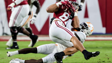 Oct 23, 2021; Tuscaloosa, Alabama, USA; Alabama Crimson Tide tight end Cameron Latu (81) catches a pass against Tennessee Volunteers defensive back Kamal Hadden (13) during the first half at Bryant-Denny Stadium. Mandatory Credit: Butch Dill-USA TODAY Sports