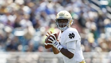 Nov 5, 2016; Jacksonville, FL, USA; Notre Dame Fighting Irish quarterback DeShone Kizer (14) looks to pass the ball in the second quarter against the Navy Midshipmen at Everbank Field. Mandatory Credit: Logan Bowles-USA TODAY Sports