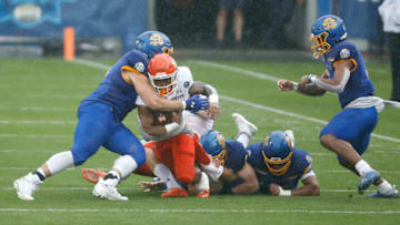 May 16, 2021; Frisco, Texas, USA; Sam Houston State Bearkats running back Ramon Jefferson (4) is tackled by South Dakota State Jackrabbits linebacker Preston Tetzlaff (46) during the first quarter in the Division I FCS Championship football game at Toyota Stadium. Mandatory Credit: Tim Heitman-USA TODAY Sports