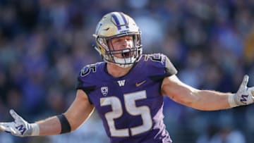 SEATTLE, WA - OCTOBER 20: Linebacker Ben Burr-Kirven #25 of the Washington Huskies reacts after making an interception in the fourth quarter against the Colorado Buffaloes at Husky Stadium on October 20, 2018 in Seattle, Washington. (Photo by Otto Greule Jr/Getty Images)