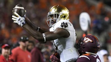 BLACKSBURG, VA - OCTOBER 6: Wide receiver Miles Boykin #81 of the Notre Dame Fighting Irish makes a reception while being defended by defensive back Jovonn Quillen #26 of the Virginia Tech Hokies in the second half at Lane Stadium on October 6, 2018 in Blacksburg, Virginia. (Photo by Michael Shroyer/Getty Images)