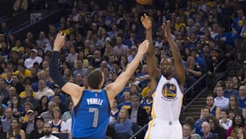 March 25, 2016; Oakland, CA, USA; Golden State Warriors forward Harrison Barnes (40) shoots the basketball against Dallas Mavericks forward Dwight Powell (7) during the fourth quarter at Oracle Arena. The Warriors defeated the Mavericks 128-120. Mandatory Credit: Kyle Terada-USA TODAY Sports