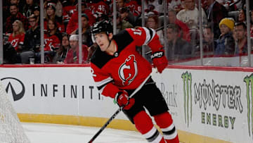 NEWARK, NJ - OCTOBER 16: Ben Lovejoy #12 of the New Jersey Devils plays the puck during game action against the Dallas Stars at Prudential Center on October 16, 2018 in Newark, New Jersey. (Photo by Andy Marlin/NHLI via Getty Images)