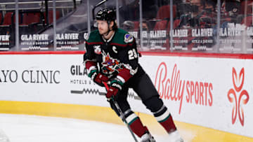 GLENDALE, ARIZONA - MAY 05: Oliver Ekman-Larsson #23 of the Arizona Coyotes skates with the puck against the Los Angeles Kings during the NHL game at Gila River Arena on May 05, 2021 in Glendale, Arizona. The Kings defeated the Coyotes 4-2. (Photo by Christian Petersen/Getty Images)
