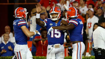 Sep 3, 2022; Gainesville, Florida, USA; Florida Gators quarterback Anthony Richardson (15) is congratulated by wide receiver Justin Shorter (4) and wide receiver Ricky Pearsall (1) as he scored a touchdown during the second quarter at Steve Spurrier-Florida Field. Mandatory Credit: Kim Klement-USA TODAY Sports