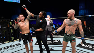 ABU DHABI, UNITED ARAB EMIRATES - JANUARY 23: In this handout image provided by the UFC, Dustin Poirier reacts after his knockout victory over Conor McGregor of Ireland in a lightweight fight during the UFC 257 event inside Etihad Arena on UFC Fight Island on January 23, 2021 in Abu Dhabi, United Arab Emirates. (Photo by Jeff Bottari/Zuffa LLC via Getty Images)