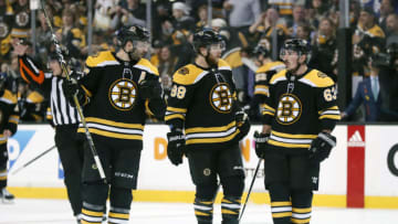 BOSTON, MA - APRIL 21: Boston's tip line of Boston Bruins center Patrice Bergeron (37), Boston Bruins right wing David Pastrnak (88) and Boston Bruins left wing Brad Marchand (63) skate out for a face off during Game 5 of the First Round for the 2018 Stanley Cup Playoffs between the Boston Bruins and the Toronto Maple Leafs on April 21, 2018, at TD Garden in Boston, Massachusetts. The Maple Leafs defeated the Bruins 4-3. (Photo by Fred Kfoury III/Icon Sportswire via Getty Images)