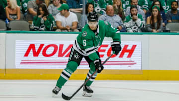 DALLAS, TX - OCTOBER 04: Dallas Stars defenseman Connor Carrick (5) gets ready to shoot the puck during the game between the Dallas Stars and the Arizona Coyotes on October 4, 2018 at the American Airlines Center in Dallas, Texas. Dallas defeats Arizona 3-0. (Photo by Matthew Pearce/Icon Sportswire via Getty Images)