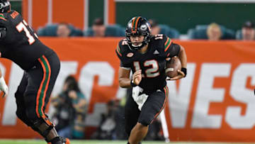 MIAMI GARDENS, FL - NOVEMBER 04: University of Miami quarterback Malik Rosier (12) runs during an NCAA football game between the Virginia Tech Hokies and the University of Miami Hurricanes on November 4, 2017 at Hard Rock Stadium, Miami Gardens, Florida. Miami defeated Virginia Tech 28-10. (Photo by Richard C. Lewis/Icon Sportswire via Getty Images)