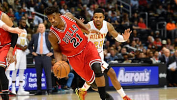 Nov 9, 2016; Atlanta, GA, USA; Chicago Bulls guard Jimmy Butler (21) dribbles past Atlanta Hawks forward Kent Bazemore (24) during the first half at Philips Arena. Mandatory Credit: Dale Zanine-USA TODAY Sports