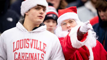 BOSTON, MA - DECEMBER 17: Louisville Cardinals fans look on during the 2022 Wasabi Fenway Bowl between the Louisville Cardinals and the Cincinnati Bearcats on December 17, 2022 at Fenway Park in Boston, Massachusetts. (Photo by Maddie Malhotra/Boston Red Sox/Getty Images)