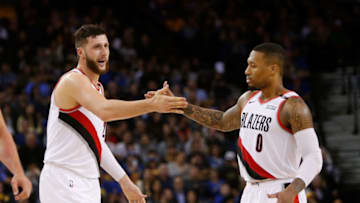 OAKLAND, CA - NOVEMBER 23: Jusuf Nurkic #27 celebrates with Damian Lillard #0 of the Portland Trail Blazers during the game against the Golden State Warriors at ORACLE Arena on November 23, 2018 in Oakland, California. NOTE TO USER: User expressly acknowledges and agrees that, by downloading and or using this photograph, User is consenting to the terms and conditions of the Getty Images License Agreement. (Photo by Lachlan Cunningham/Getty Images)