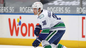 TORONTO, ON - FEBRUARY 6: Nils Hoglander #36 of the Vancouver Canucks skates against the Toronto Maple Leafs during an NHL game at Scotiabank Arena on February 6, 2021 in Toronto, Ontario, Canada. The Maple Leafs defeated the Canucks 5-1. (Photo by Claus Andersen/Getty Images) ** Local Caption *** Nils Hoglander