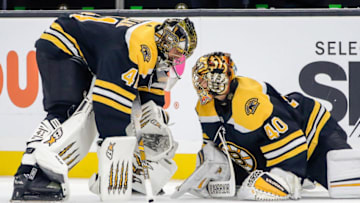 BOSTON, MA - OCTOBER 14: Boston Bruins goaltender Jaroslav Halak (41) and Boston Bruins goaltender Tuukka Rask (40) talk during warmups prior to the Anaheim Ducks and Boston Bruins NHL game on October 14, 2019, at TD Garden in Boston, MA. (Photo by John Crouch/Icon Sportswire via Getty Images)