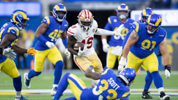 INGLEWOOD, CA - JANUARY 30: Deebo Samuel #19 of the San Francisco 49ers heads to the end zone on a 44-yard touchdown catch during the game against the Los Angeles Rams at SoFi Stadium on January 30, 2022 in Inglewood, California. The Rams defeated the 49ers 20-17. (Photo by Michael Zagaris/San Francisco 49ers/Getty Images)