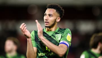 BARNSLEY, ENGLAND - JANUARY 29: Lloyd Kelly of AFC Bournemouth during the Sky Bet Championship match between Barnsley and AFC Bournemouth at Oakwell Stadium on January 29, 2022 in Barnsley, England. (Photo by Robbie Jay Barratt - AMA/Getty Images)