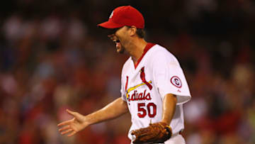 ST. LOUIS, MO - AUGUST 23: Starting pitcher Adam Wainwright #50 of the St. Louis Cardinals celebrates after throwing a complete game to beat the Atlanta Braves at Busch Stadium on August 23, 2013 in St. Louis, Missouri. The Cardinals beat the Braves 3-1. (Photo by Dilip Vishwanat/Getty Images)