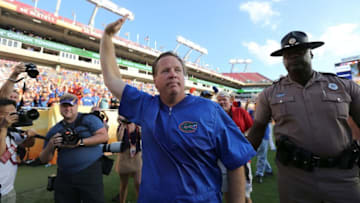 Jan 2, 2017; Tampa , FL, USA; Florida Gators head coach Jim McElwain waves to the fans after defeating the Iowa Hawkeyes 30-3 at Raymond James Stadium. Mandatory Credit: Kim Klement-USA TODAY Sports