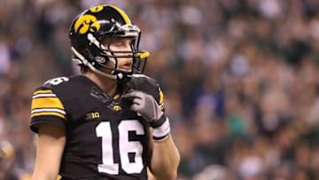 Dec 5, 2015; Indianapolis, IN, USA; Iowa Hawkeyes quarterback C.J. Beathard (16) looks on during the first quarter against the Michigan State Spartans in the Big Ten Conference football championship game at Lucas Oil Stadium. Mandatory Credit: Aaron Doster-USA TODAY Sports