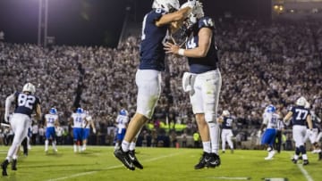 STATE COLLEGE, PA - SEPTEMBER 07: Pat Freiermuth #87 of the Penn State Nittany Lions celebrates with Sean Clifford #14 after catching a pass for a touchdown against the Buffalo Bulls during the second half at Beaver Stadium on September 07, 2019 in State College, Pennsylvania. (Photo by Scott Taetsch/Getty Images)