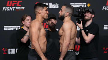 LAS VEGAS, NEVADA - APRIL 15: (L-R) Opponents Vicente Luque of Brazil and Belal Muhammad face off during the UFC weigh-in at UFC APEX on April 15, 2022 in Las Vegas, Nevada. (Photo by Jeff Bottari/Zuffa LLC)
