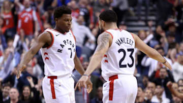 TORONTO, ON - OCTOBER 19: Kyle Lowry #7 and Fred VanVleet #23 of the Toronto Raptors react late in the second half of an NBA game against the Boston Celtics at Scotiabank Arena on October 19, 2018 in Toronto, Canada. NOTE TO USER: User expressly acknowledges and agrees that, by downloading and or using this photograph, User is consenting to the terms and conditions of the Getty Images License Agreement. (Photo by Vaughn Ridley/Getty Images)