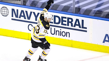 TORONTO, ONTARIO - AUGUST 23: Charlie Coyle #13 of the Boston Bruins celebrates after scoring a goal against the Tampa Bay Lightning at 18:52 during the first period in Game One of the Eastern Conference Second Round during the 2020 NHL Stanley Cup Playoffs at Scotiabank Arena on August 23, 2020 in Toronto, Ontario. (Photo by Elsa/Getty Images)