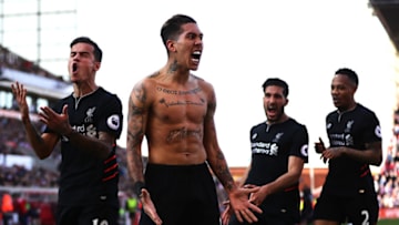 STOKE ON TRENT, ENGLAND - APRIL 08: Roberto Firmino of Liverpool celebrates scoring his side's second goal during the Premier League match between Stoke City and Liverpool at Bet365 Stadium on April 8, 2017 in Stoke on Trent, England. (Photo by Chris Brunskill Ltd/Getty Images)