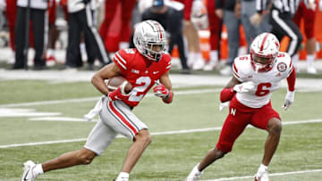 Ohio State Buckeyes wide receiver Chris Olave (2) heads up field after a catch against Nebraska Cornhuskers cornerback Quinton Newsome (6) during the 3rd quarter in their NCAA Division I football game on Saturday, Oct. 24, 2020 at Ohio Stadium in Columbus, Ohio.Osu20neb Kwr 36