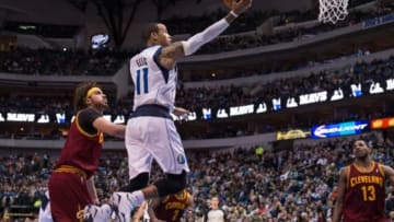 Feb 3, 2014; Dallas, TX, USA; Dallas Mavericks shooting guard Monta Ellis (11) drives to the basket past Cleveland Cavaliers center Anderson Varejao (17) during the first half at American Airlines Center. Mandatory Credit: Jerome Miron-USA TODAY Sports