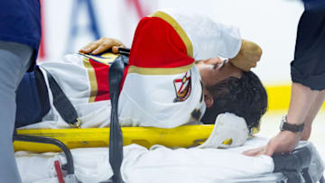 OTTAWA, ON - NOVEMBER 19: Florida Panthers Center Vincent Trocheck (21) is taken off the ice on a stretcher during first period National Hockey League action between the Florida Panthers and Ottawa Senators on November 19, 2018, at Canadian Tire Centre in Ottawa, ON, Canada. (Photo by Richard A. Whittaker/Icon Sportswire via Getty Images)