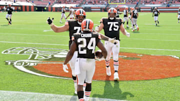 CLEVELAND, OHIO - SEPTEMBER 27: Offensive tackle Jack Conklin #78 and offensive guard Joel Bitonio #75 of the Cleveland Browns celebrate with running back Nick Chubb #24 of the Cleveland Browns after Chubb ran for a touchdown against the Washington Football Team during the fourth quarter at FirstEnergy Stadium on September 27, 2020 in Cleveland, Ohio. The Browns defeated the Washington Football Team 34-20. (Photo by Jason Miller/Getty Images)