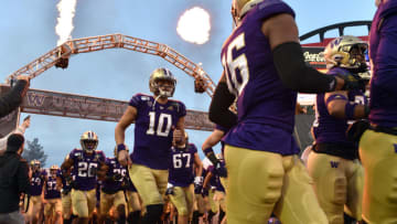 LAS VEGAS, NEVADA - DECEMBER 21: Quarterback Jacob Eason #10 of the Washington Huskies runs on to the field prior to the team's game against the Boise State Broncos in the Mitsubishi Motors Las Vegas Bowl at Sam Boyd Stadium on December 21, 2019 in Las Vegas, Nevada. (Photo by David Becker/Getty Images)