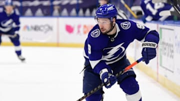 Feb 3, 2021; Tampa, Florida, USA; Tampa Bay Lightning center Tyler Johnson (9) handles the puck during the third period against the Detroit Red Wings at Amalie Arena. Mandatory Credit: Douglas DeFelice-USA TODAY Sports