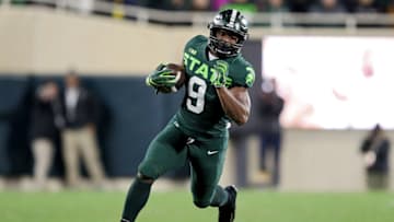 EAST LANSING, MICHIGAN - NOVEMBER 13: Kenneth Walker III #9 of the Michigan State Spartans runs up the field in the first half against the Maryland Terrapins at Spartan Stadium on November 13, 2021 in East Lansing, Michigan. (Photo by Mike Mulholland/Getty Images)