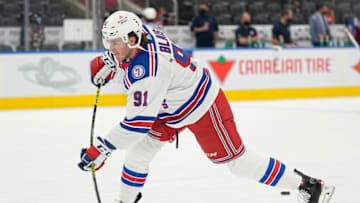 Oct 18, 2021; Toronto, Ontario, CAN; New York Rangers forward Sammy Blais (91) shoots the puck during warm up before a game against the Toronto Maple Leafs at Scotiabank Arena. Mandatory Credit: John E. Sokolowski-USA TODAY Sports