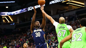 MINNEAPOLIS, MN - JANUARY 12: Julius Randle #30 of the New Orleans Pelicans shoots the ball while Taj Gibson #67 of the Minnesota Timberwolves defends. (Photo by David Berding/Getty Images)