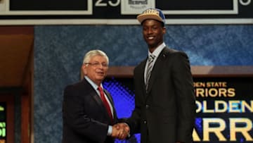 NEWARK, NJ - JUNE 28: Harrison Barnes (R) of North Carolina greets NBA Commissioner David Stern (L) after he was selected number seven overall by the Golden State Warriors during the first round of the 2012 NBA Draft at Prudential Center on June 28, 2012 in Newark, New Jersey. NOTE TO USER: User expressly acknowledges and agrees that, by downloading and/or using this Photograph, user is consenting to the terms and conditions of the Getty Images License Agreement. (Photo by Elsa/Getty Images)