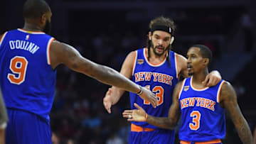Nov 1, 2016; Auburn Hills, MI, USA; New York Knicks forward Kyle O'Quinn (9) high fives guard Brandon Jennings (3) and center Joakim Noah (13) during the second quarter against the Detroit Pistons at The Palace of Auburn Hills. Mandatory Credit: Tim Fuller-USA TODAY Sports