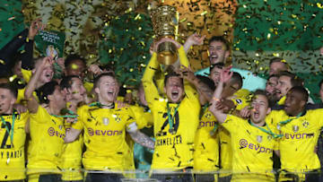 Lukas Piszczek lifts the DFB-Pokal trophy (Photo by Filip Singer - Pool/Getty Images)