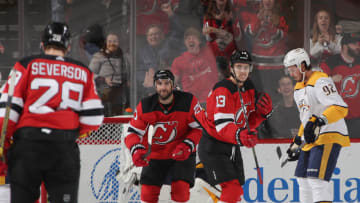 Kyle Palmieri #21 and Nico Hischier #13 of the New Jersey Devils (Photo by Bruce Bennett/Getty Images)