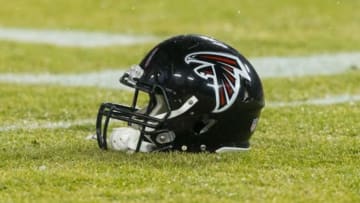 Dec 8, 2014; Green Bay, WI, USA; An Atlanta Falcons helmet sits on the field during warmups prior to the game against the Green Bay Packers at Lambeau Field. Green Bay won 43-37. Mandatory Credit: Jeff Hanisch-USA TODAY Sports