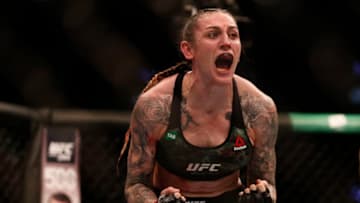 MELBOURNE, AUSTRALIA - OCTOBER 06: Megan Anderson of Australia celebrates her win over Zarah Fairn of France in the Women's featherweight bout during UFC 243 at Marvel Stadium on October 06, 2019 in Melbourne, Australia. (Photo by Darrian Traynor/Getty Images)