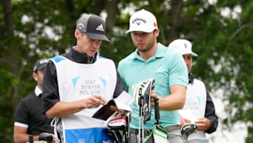 May 16, 2021; McKinney, Texas, USA; Sam Burns waits to play along with his caddie Travis Perkins during the final round of the AT&T Byron Nelson golf tournament. Mandatory Credit: Jim Cowsert-USA TODAY Sports