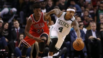 Dec 9, 2015; Boston, MA, USA; Boston Celtics guard Isaiah Thomas (4) returns the ball against Chicago Bulls guard Jimmy Butler (21) in the second half at TD Garden. Celtics defeated the Bulls 105-100. Mandatory Credit: David Butler II-USA TODAY Sports