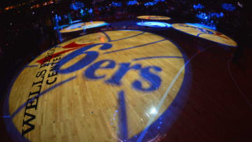 PHILADELPHIA, PA - DECEMBER 7: The Philadelphia 76ers logo on the court before the game against the Boston Celtics at the Wells Fargo Center on December 7, 2012 in Philadelphia, Pennsylvania. NOTE TO USER: User expressly acknowledges and agrees that, by downloading and or using this photograph, User is consenting to the terms and conditions of the Getty Images License Agreement. Mandatory Copyright Notice: Copyright 2012 NBAE (Photo by Jesse D. Garrabrant/NBAE via Getty Images)