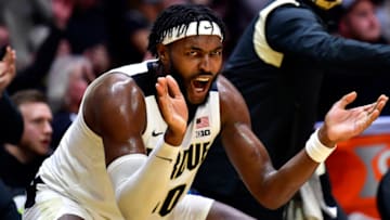 Dec 3, 2021; West Lafayette, Indiana, USA; Purdue Boilermakers forward Trevion Williams (50) cheers on his team during the second half against the Iowa Hawkeyes at Mackey Arena. Boilermakers won 77-70. Mandatory Credit: Marc Lebryk-USA TODAY Sports